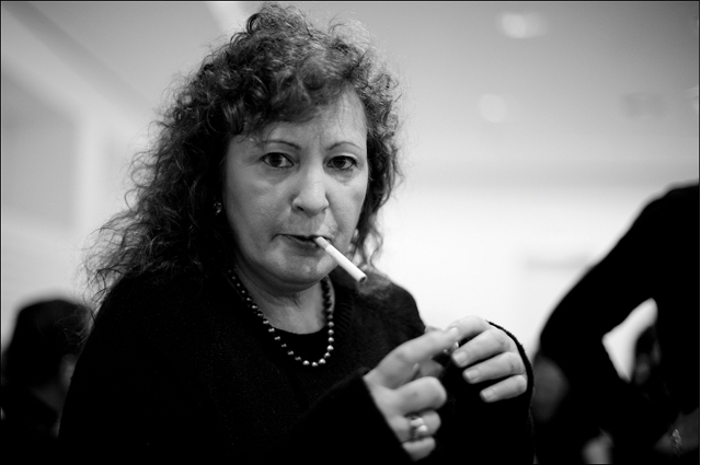 Nan Goldin smoking at booksigning Berlinische Galerie